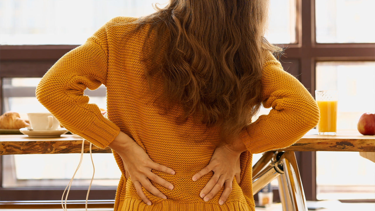 Girl Having a Backbone Pain